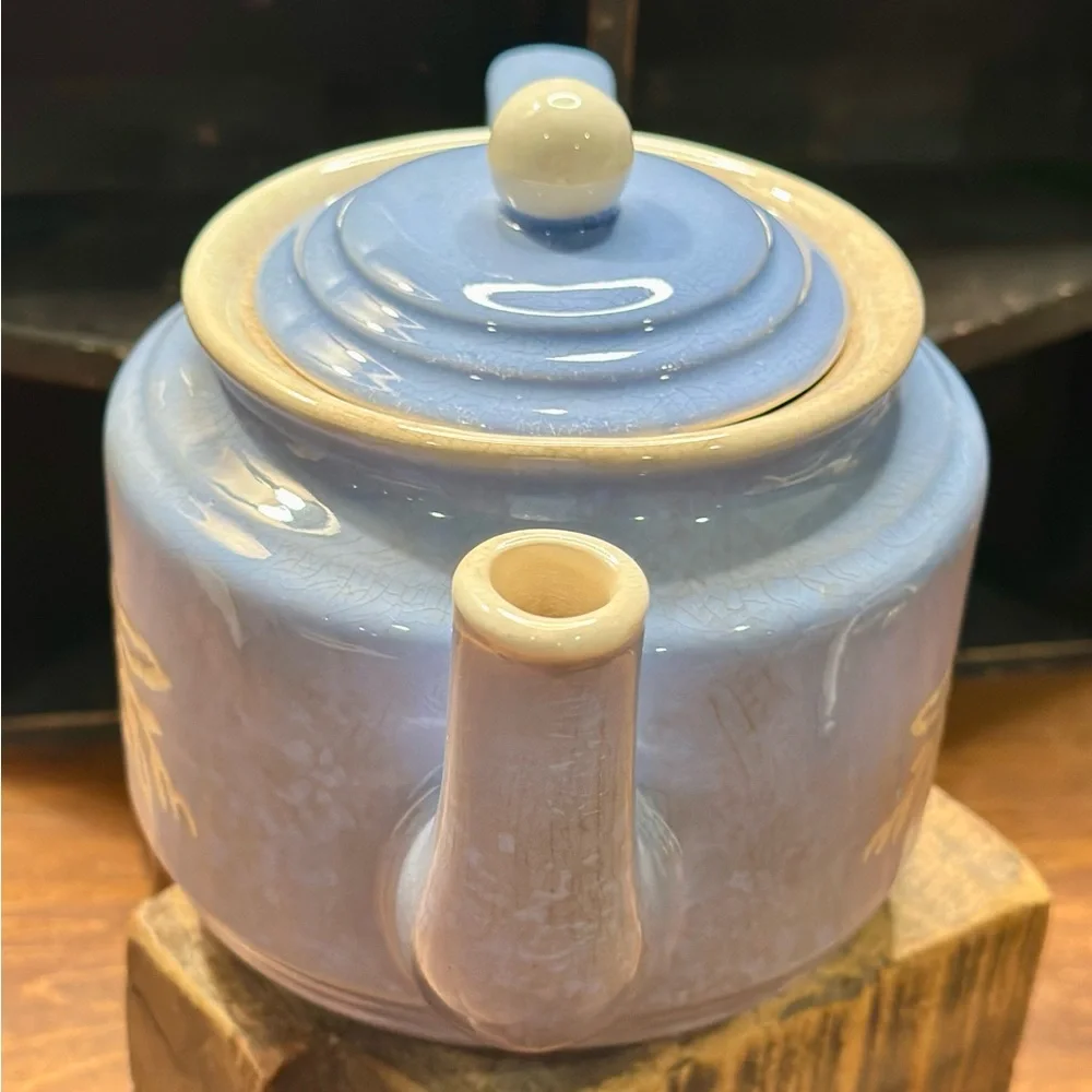 Vintage Blue Ceramic Teapot with Floral Design and Lid